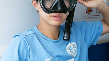 Blue Coral Diving - PADI Dive Center Hoi An Vietnam | Hoi An Diving Center | Young customer trying on mask and snorkel.