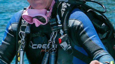 Blue Coral Diving - PADI Dive Center Hoi An Vietnam | Hoi An Diving Center | Happy divemaster coming up the ladder after a great dive in Hoi An.