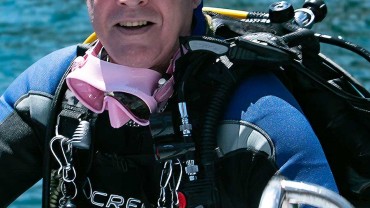 Blue Coral Diving - PADI Dive Center Hoi An Vietnam | Hoi An Diving Center | Happy divemaster coming up the ladder after a great dive in Hoi An.