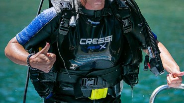 Blue Coral Diving - PADI Dive Center Hoi An Vietnam | Hoi An Diving Center | Divemaster coming up the ladder after a great dive in Hoi An thumbs up.